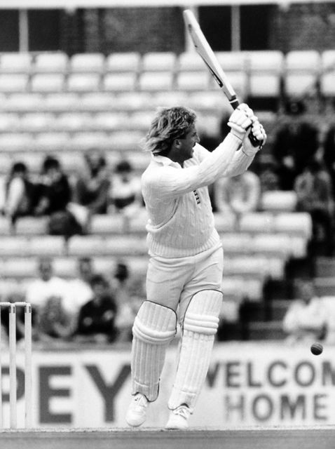 Ian Botham batting (PA)