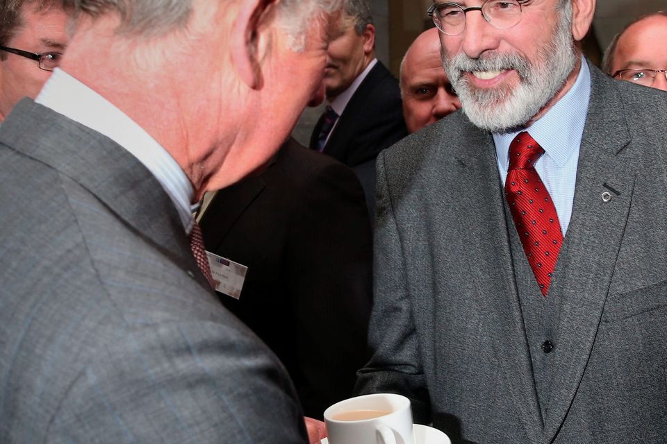 The Prince of Wales (left) shakes hands with Sinn Fein president Gerry Adams at the National University of Ireland in Galway, Ireland.