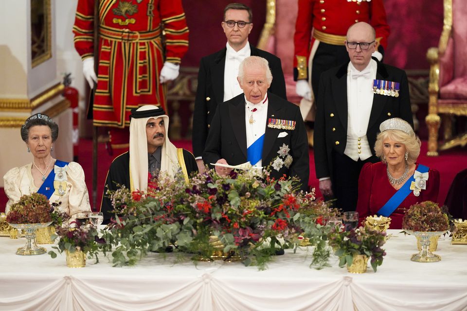 The King and Queen with the Emir of Qatar Sheikh Tamim bin Hamad Al Thani and the Princess Royal during the state banquet (Jordan Pettitt/PA)