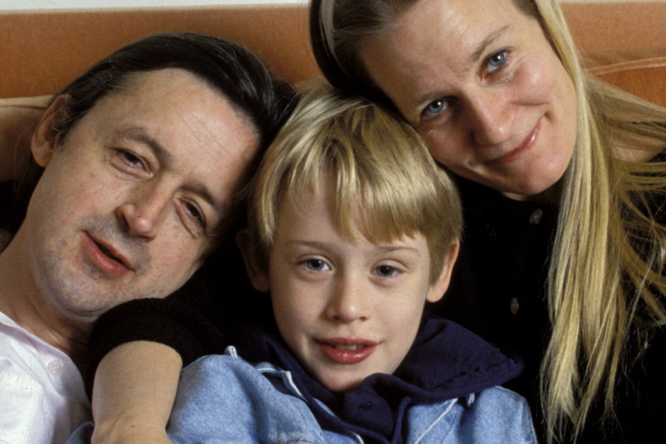 Troubled childhood: Macaulay Culkin with mum Patricia and father Kit in 1990