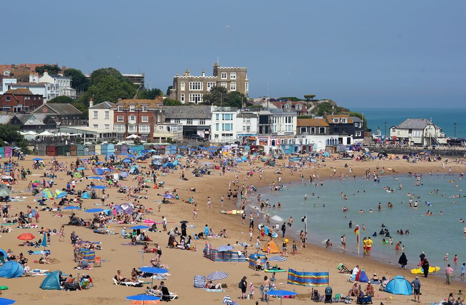 People flock to the beach in the summer sun in Broadstairs, Kent, in August (Gareth Fuller/PA)