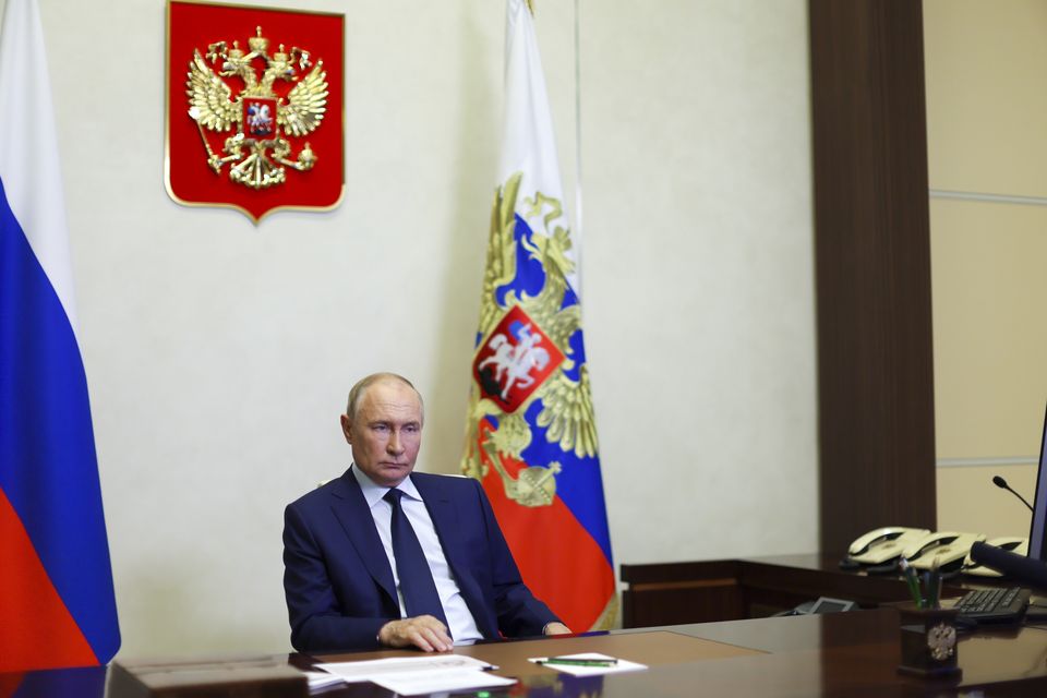 Russian President Vladimir Putin listens to acting governor of the Kursk region Alexei Smirnov during a meeting via video conference at the Novo-Ogaryovo state residence outside Moscow (Gavriil Grigorov/Sputnik, Kremlin Pool Photo via AP)