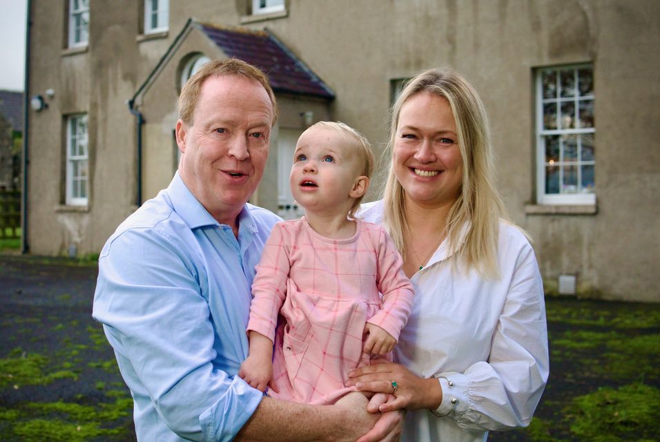 Olivia and Kieran McDaid pictured outside their home in Co Londonderry with their daughter Luna