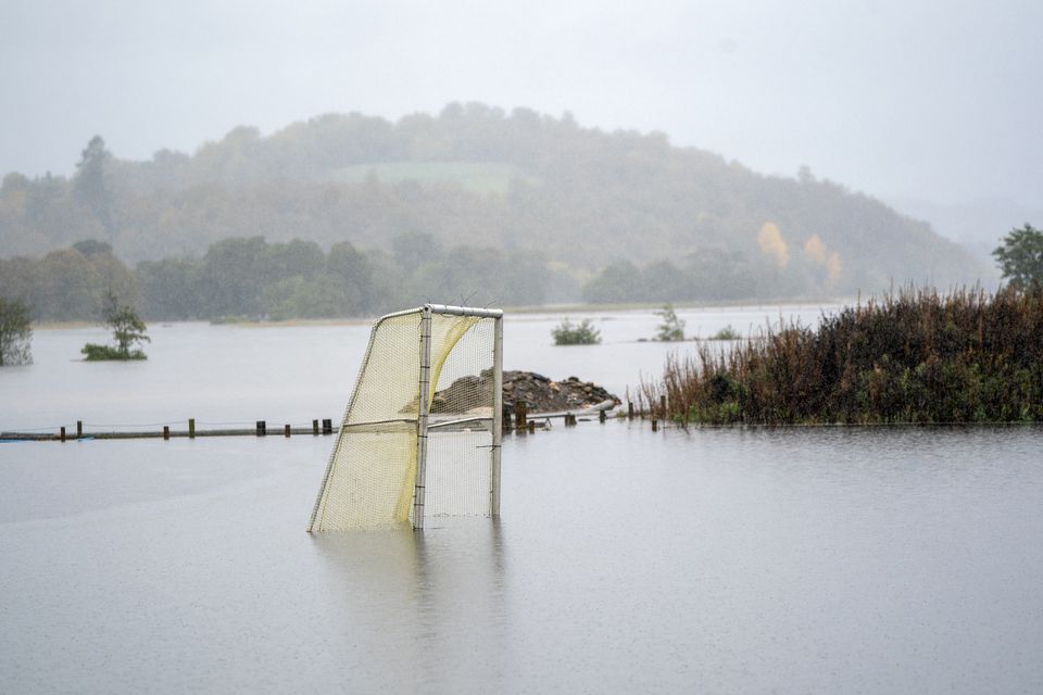 Floodwater around the Kingussie Camanachd Club at the Dell in Kingussie near Aviemore in October 2023 (Jane Barlow/PA)