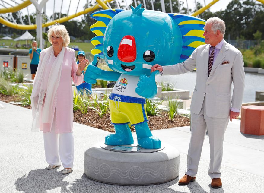 The Prince of Wales and Duchess of Cornwall with the mascot Borobi during a visit to the Commonwealth Games athletes’ village in Gold Coast in 2018 (Phil Noble/PA)