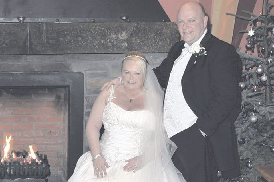 Great day: Ronnie and Norah Coates (nee McGuckian) on their wedding day in Ballygally Castle‘
<p><b>To send us your Wedding Pics <a  href="http://www.belfasttelegraph.co.uk/usersubmission/the-belfast-telegraph-wants-to-hear-from-you-13927437.html" title="Click here to send your pics to Belfast Telegraph">Click here</a> </a></p></b>