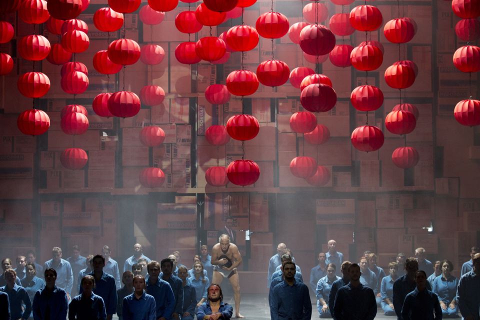 Cardboard boxes and workers’ blue overalls give a contemporary twist to the version of Turandot at the Grand Opera House
