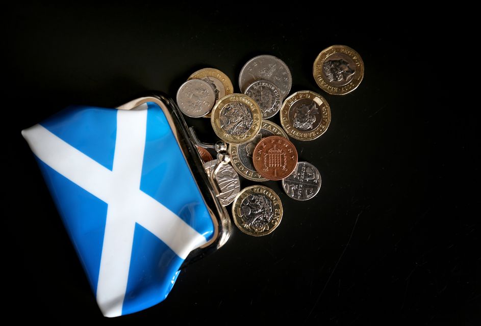 John Swinney said money needed to be raised to fund public services (Jane Barlow/PA)