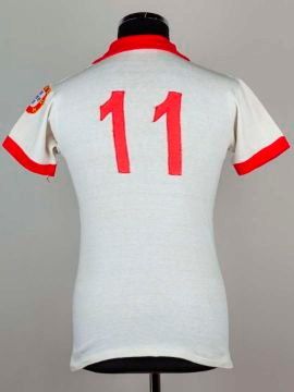 The number 11 shirt from Benfica player Antonio Simoes worn by George Best