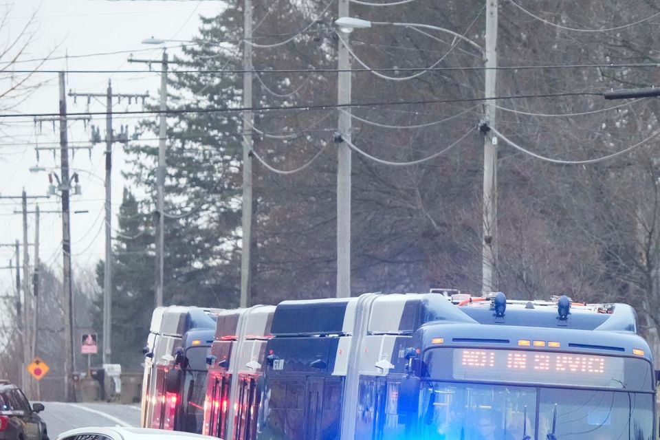 Emergency vehicles outside the Abundant Life Christian School in Madison (Morry Gash/AP)