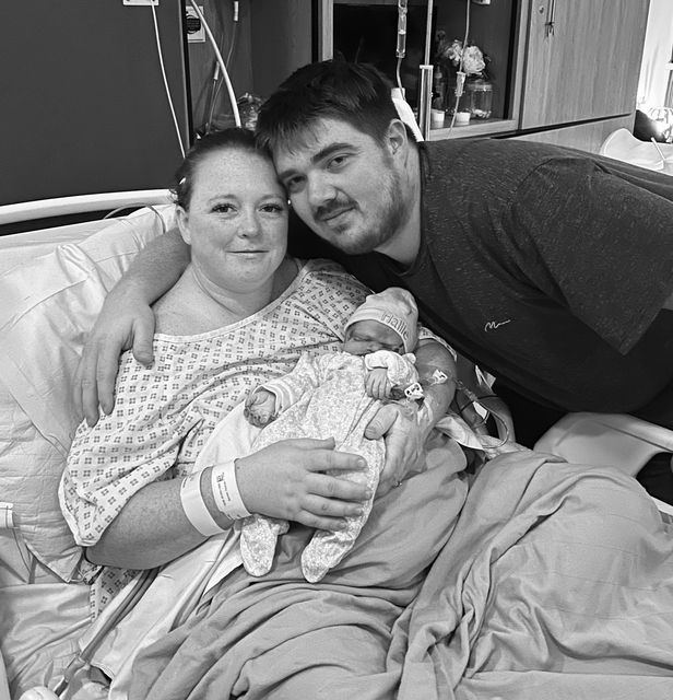 Lexi Peters and Sean Chamberlain with their stillborn daughter Hallie (Lexi Peters/PA)