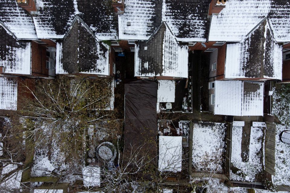 The couple’s back garden covered by plastic sheeting in December 2022 (Jacob King/PA)