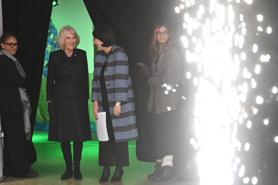 Camilla was greeted by fireworks at the east London school (Eddie Mulholland/The Telegraph/PA)