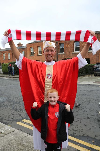 2024 Sports Direct FAI Cup Final, Aviva Stadium, Dublin 10/11/2024
Drogheda V Derry City
Marty ‘The Bishop’ McLaughlin and his grandson Harper Harkin 
Mandatory Credit ©INPHO/Lorcan Doherty