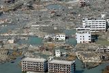 thumbnail: Rubble is scattered across the wide areas of the town of Minami Sanriku, northeastern Japan, on Sunday March 13, 2011, two days after a powerful earthquake and tsunami hit the the country's northeastern coast. (AP Photo/Kyodo News) MANDATORY CREDIT, NO LICENSING ALLOWED IN CHINA, HONG  KONG, JAPAN, SOUTH KOREA AND FRANCE
