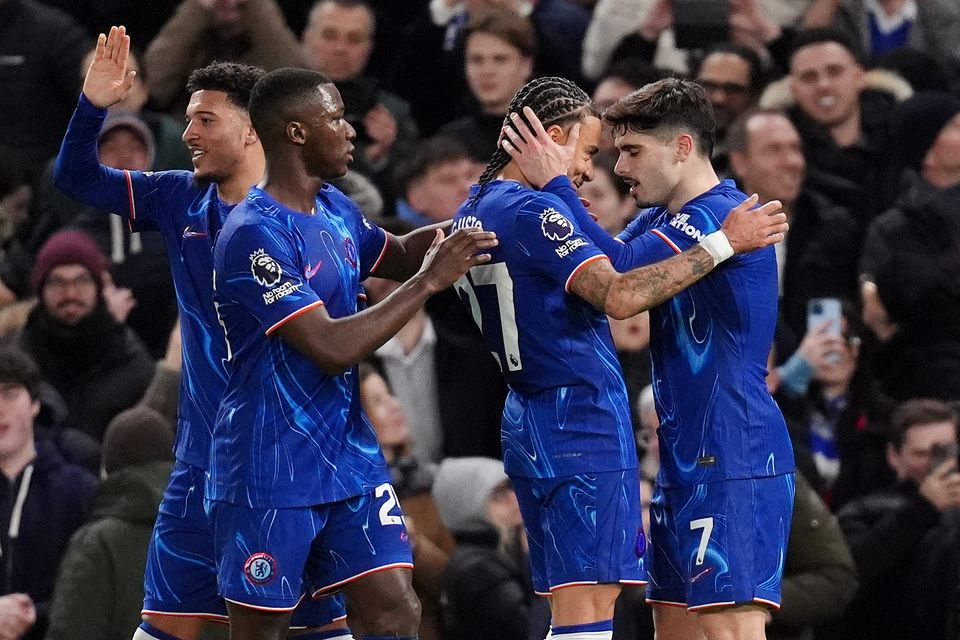 Pedro Neto, right, celebrates after scoring Chelsea’s second (John Walton/PA)