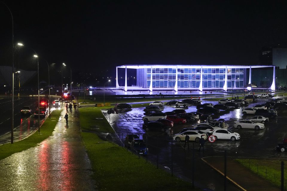 Police cordon off the Supreme Court in Brasília, Brazil, following the explosion (Eraldo Peres/AP)