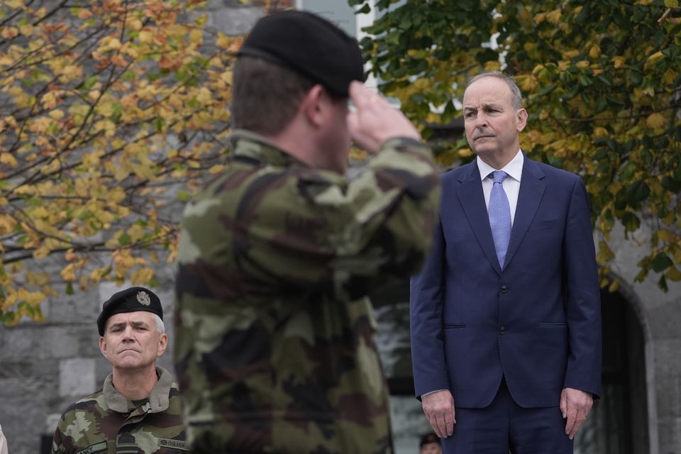 Tanaiste and Minister for Defence, Micheal Martin and the Chief of Staff, Lieutenant Sean Clancy, review Irish troops (Brian Lawless/PA)