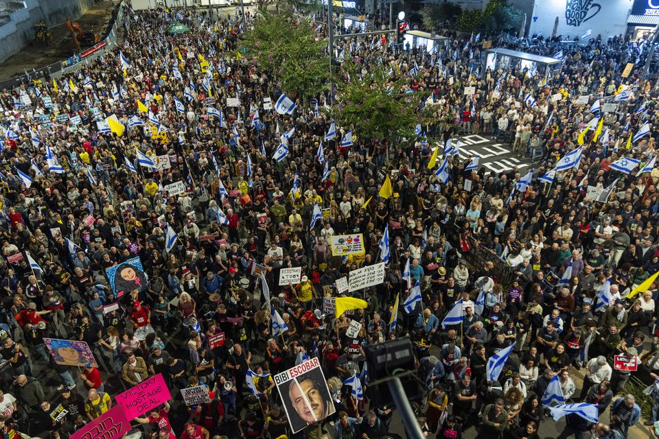 People gather in Tel Aviv to protest against Benjamin Netanyahu’s government and call for the release of hostages held in the Gaza Strip by Hamas (Francisco Seco/AP)