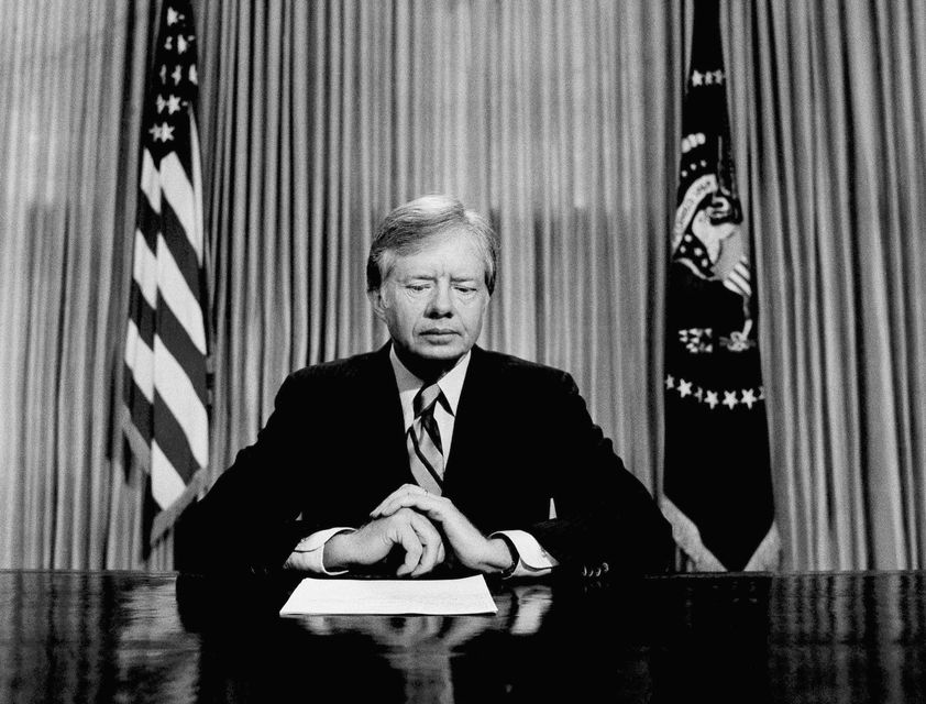 Jimmy Carter prepares to make a national television address as president from the Oval Office at the White House in April 1980 (AP)