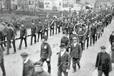 thumbnail: Into the unknown: Rifleman Jackson Clarke (circled) marching off to war