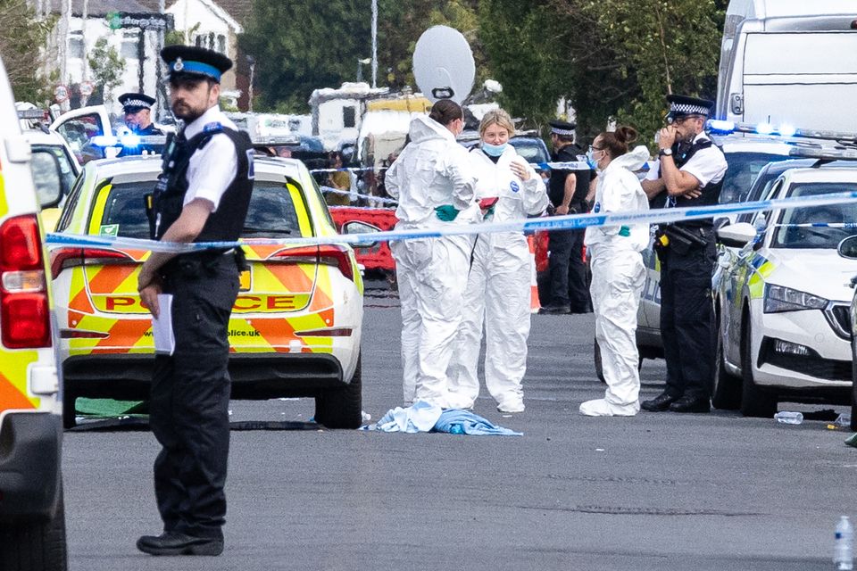 Police scenes-of-crime officers in Hart Street, Southport, after the incident (James Speakman/PA)