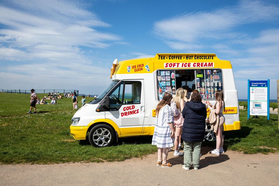 Enjoying an ice cream at Crawfordsburn. Pic: Graham Baalham-Curry/PressEye