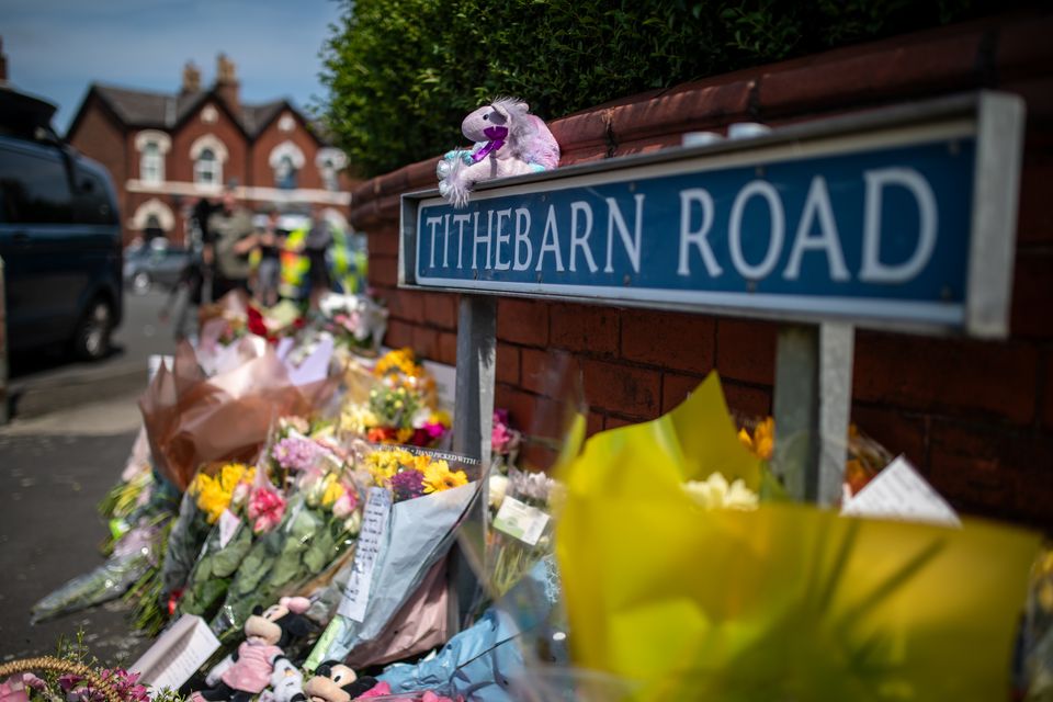 Flowers and tributes near the scene in Hart Street, Southport, where three children died and eight were injured in the knife attack (James Speakman/PA)