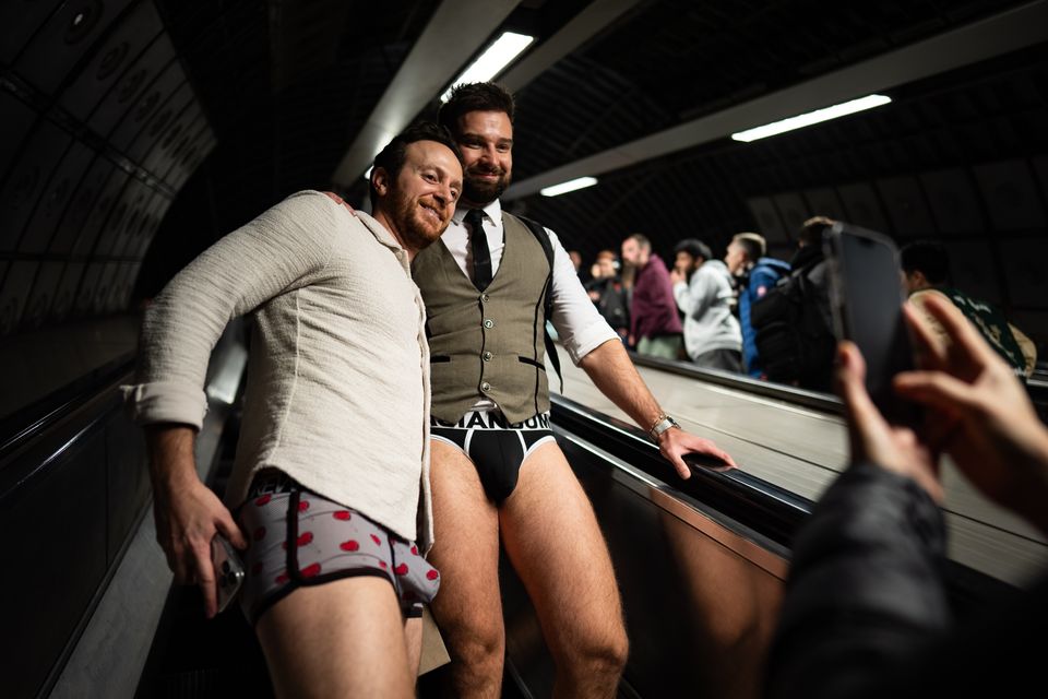 Men strutting on the escalators on the London Underground (Aaron Chown/PA)