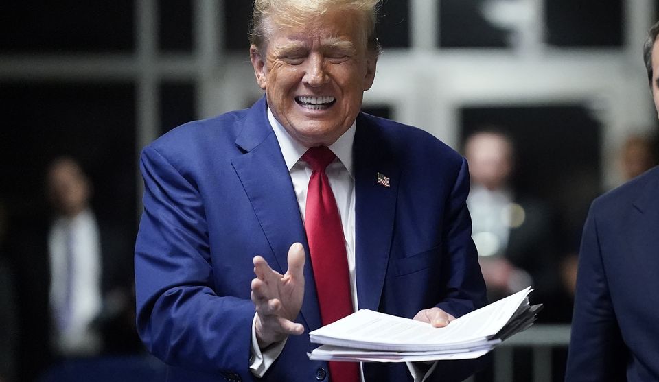 Former president Donald Trump speaks to the press before leaving for the day at his trial at Manhattan Criminal Court in New York (Timothy A Clary/Pool Photo via AP)