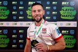 thumbnail: John Cooney holds his Man of the Match medal following Ulster's victory over Benetton