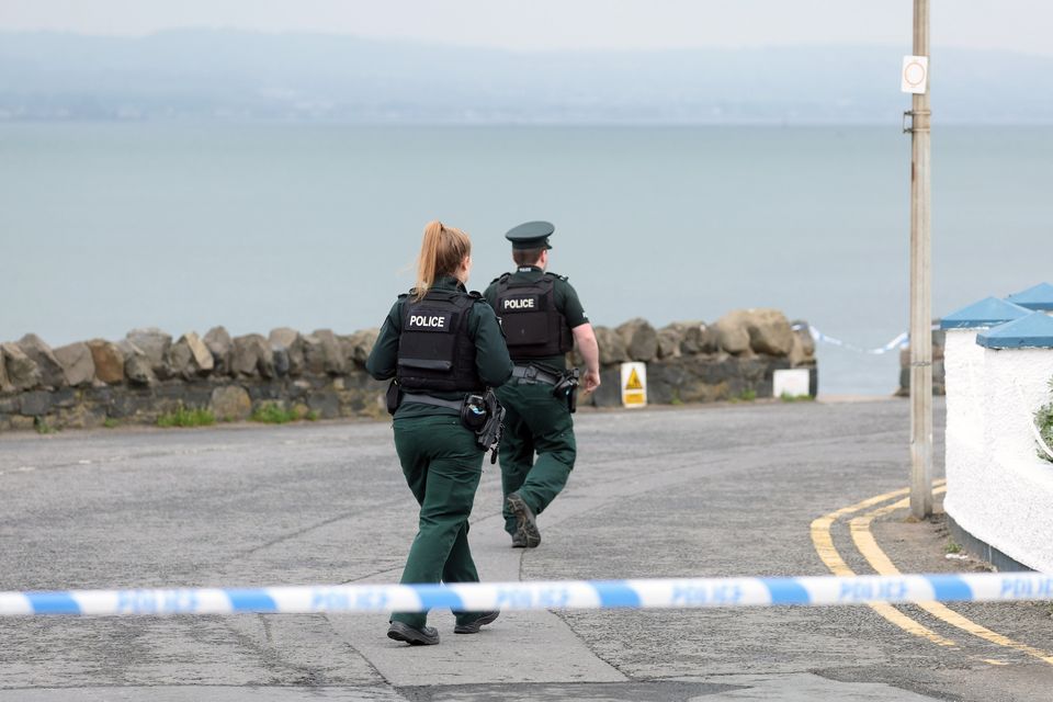 Police at the scene after a woman’s body was found on a beach in Cultra. Image: Jonathan Porter / Press Eye