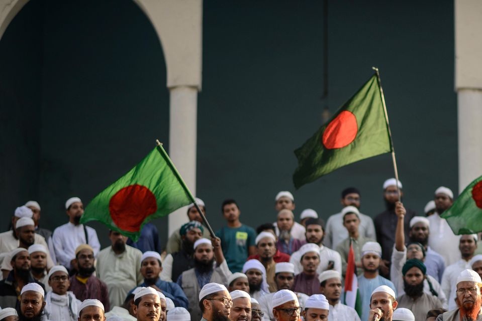 Members of Islami Andolan Bangladesh shout slogans during a protest in Dhaka after Hindus in Agartala stormed a consulate office of Bangladesh (Mahmud Hossain Opu/AP)