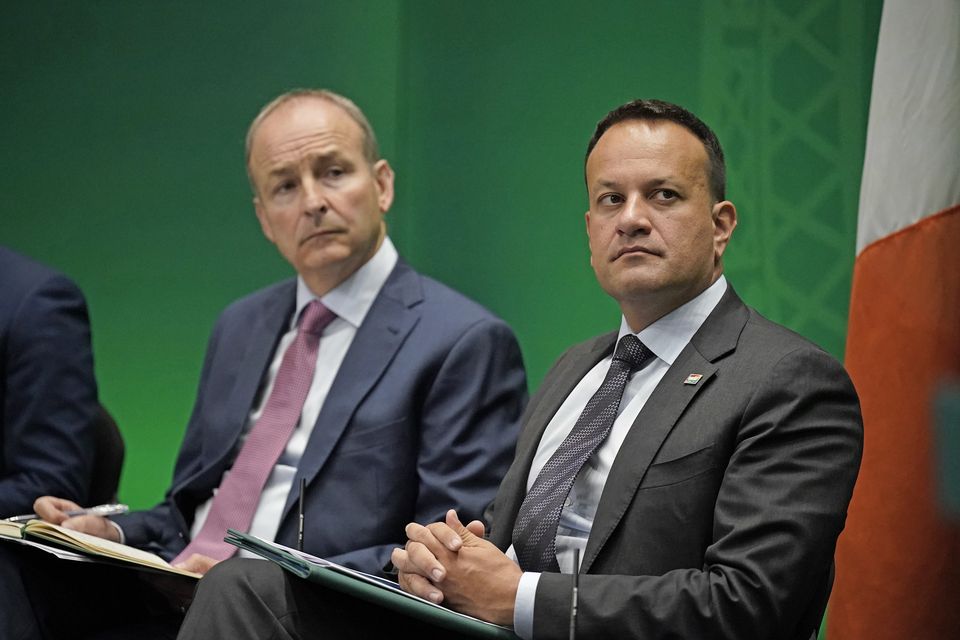 Fianna Fail leader Micheal Martin and former Fine Gael leader Leo Varadkar (Niall Carson/PA)