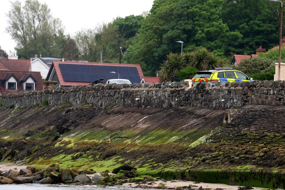 Police at the scene after a woman’s body was found on a beach in Cultra. Image: Jonathan Porter/Press Eye