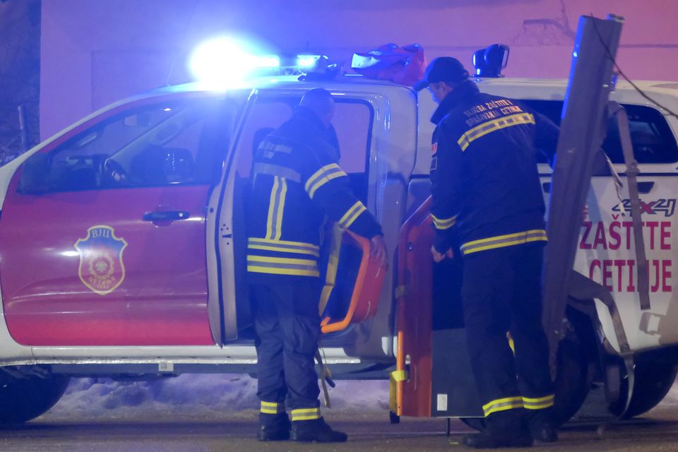 Rescue workers at the site of the shooting in Cetinje, Montenegro (AP Photo/Risto Bozovic)