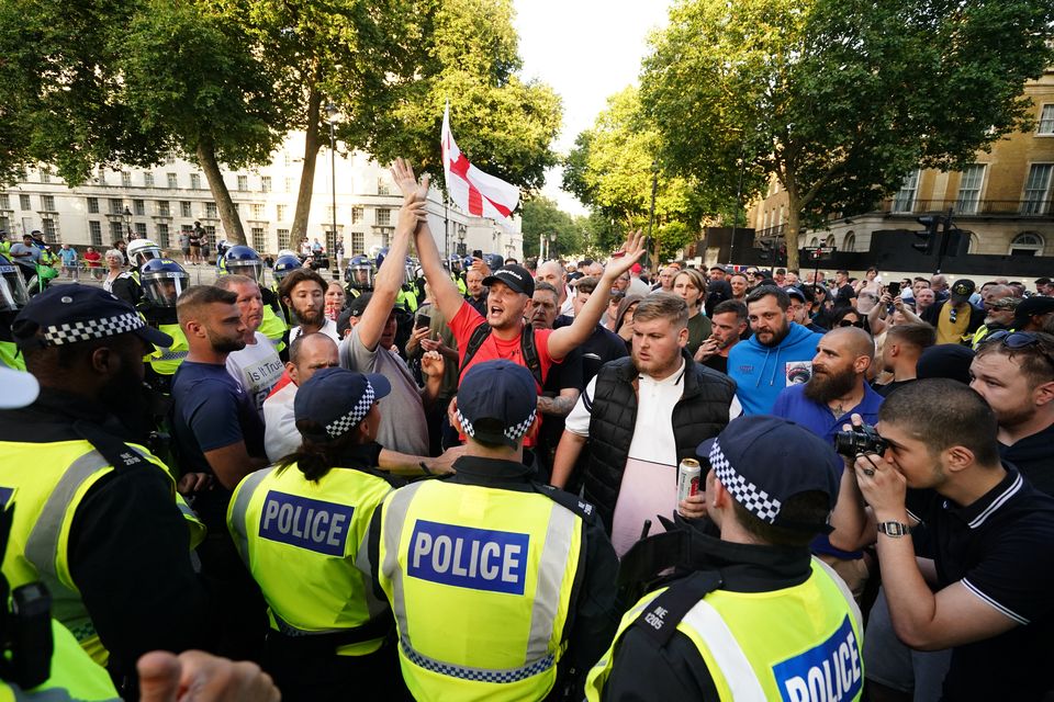 People attending the protest in Whitehall (Jordan Pettitt/PA)