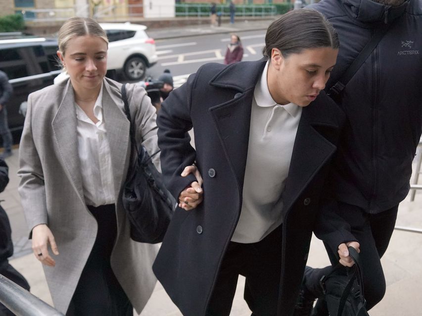 Chelsea and Australia striker Sam Kerr arrives with her partner Kristie Mewis (Jonathan Brady/PA)