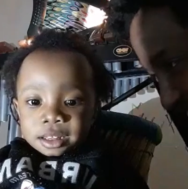 Abiyah Yasharahyalah, seen with his father in a video recorded at least a year before his death (West Midlands Police/PA)