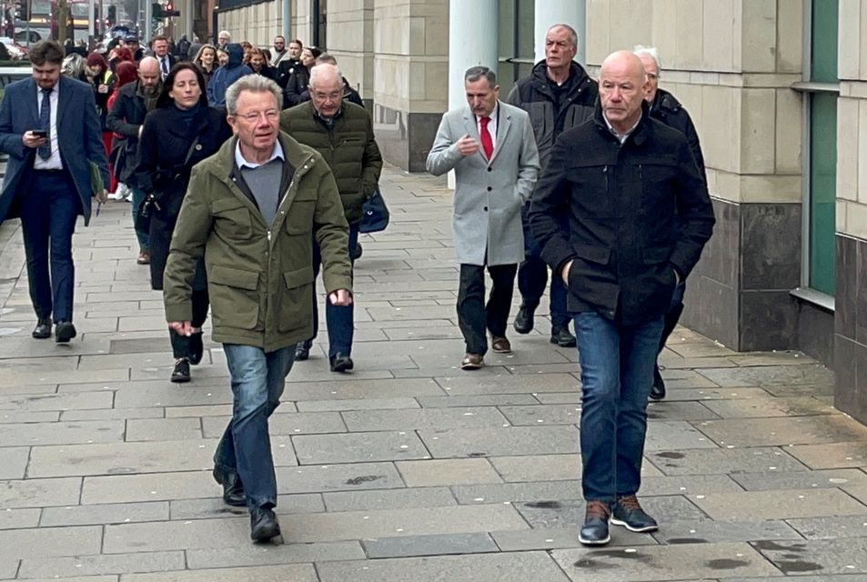 Members of William McKinney’s family and supporters arrive at Laganside courts in Belfast ahead of the latest hearing in the prosecution of Soldier F (David Young/PA)