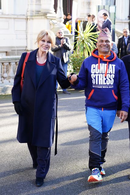 Dame Joanna Lumley with restaurant owner Sujan Katuwal outside the Embassy Of Nepal as he set off on his challenge (Ian West/PA)