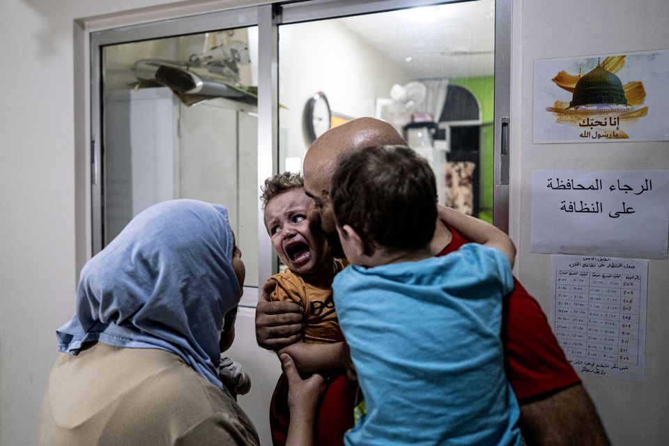 A child is brought to hospital after last night's Israeli attack on Beirut. Photo: Getty