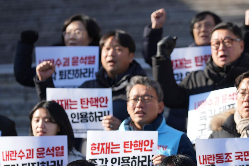 Members of civic groups shout slogans during a rally demanding South Korea’s impeached President Yoon Suk Yeol to resign (AP/Lee Jin-man)