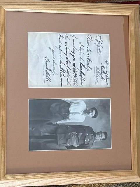 Frank Hills with his wife Constance next to a letter he wrote to her (family handout/PA)