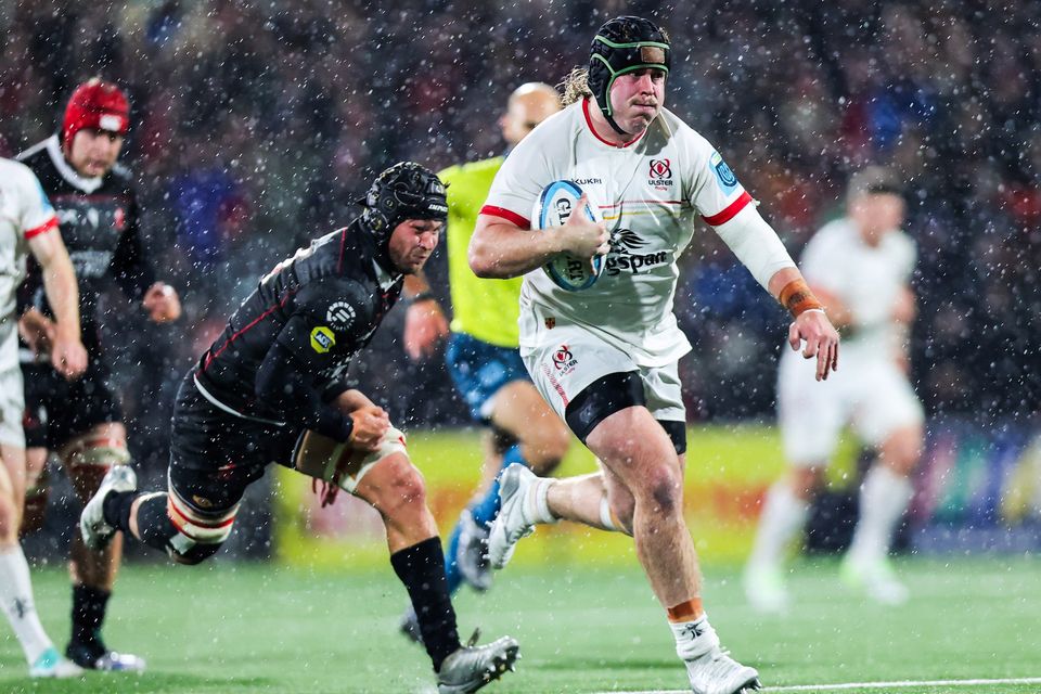 Ulster’s Scott Wilson moves forward with the ball during their clash against the Lions
