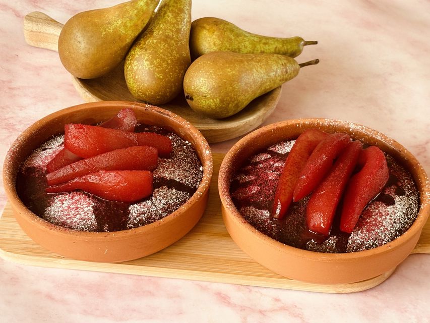 Chocolate and almond puddings with raspberry poached pears