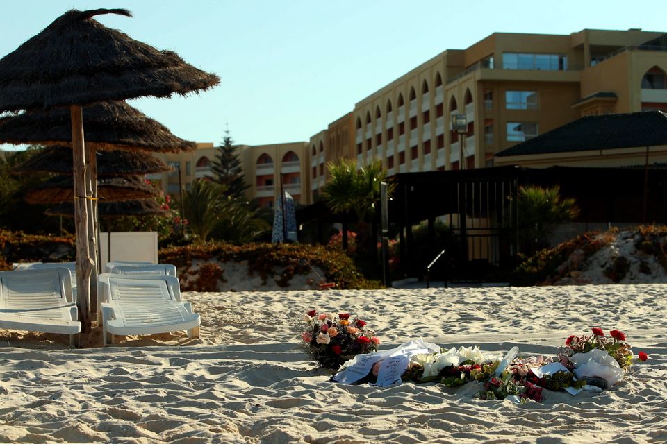 Tributes remain on the beach near the RIU Imperial Marhaba hotel in Sousse, Tunisia, following the terror attacks on the beach. PRESS ASSOCIATION Photo. Picture date: Wednesday July 1, 2015. The number of British tourists killed in the Tunisia terrorist attack who have been positively identified has reached 29, Foreign Secretary Philip Hammond said. See PA POLICE Tunisia stories. Photo credit should read: Steve Parsons/PA Wire
