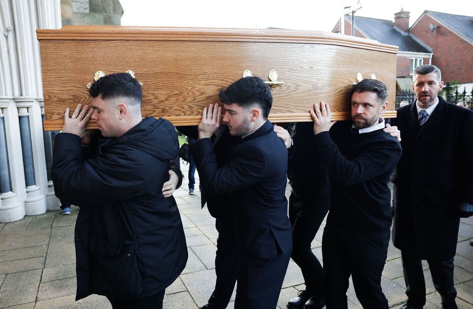 Press Eye - Belfast - Northern Ireland - 24th December 2024 

Naoise î Caireall‡in (M—gla’ Bap) from Kneecap joins family members at the funeral of his father, Irish language leader Gear—id î Caireall‡in at St PeterÕs Cathedral in west Belfast. 

The 67-year-old headed Conradh na Gaelic between 1995 and 1998 and was a central figure in the 1991 establishment of Col‡iste Feirste.


Photo by Kelvin Boyes / Press Eye 