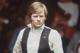 thumbnail: Alex Higgins considering his next shot during the 1983  World Snooker Championships in Sheffield.