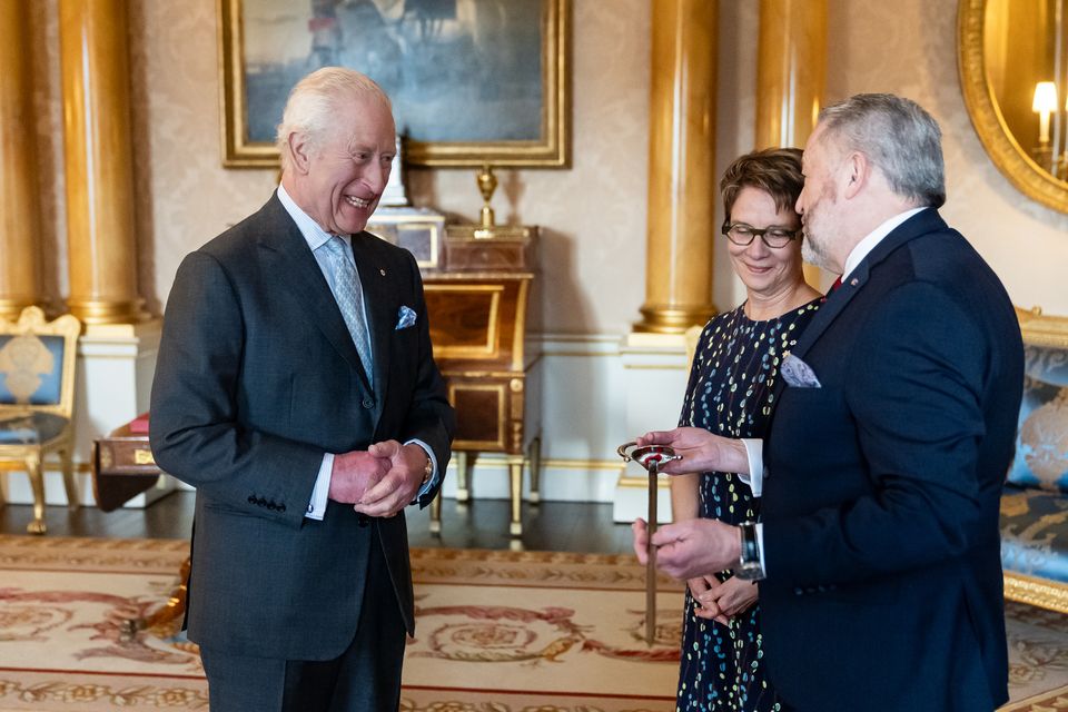 The King speaking with his guests at the Palace (Aaron Chown/PA)